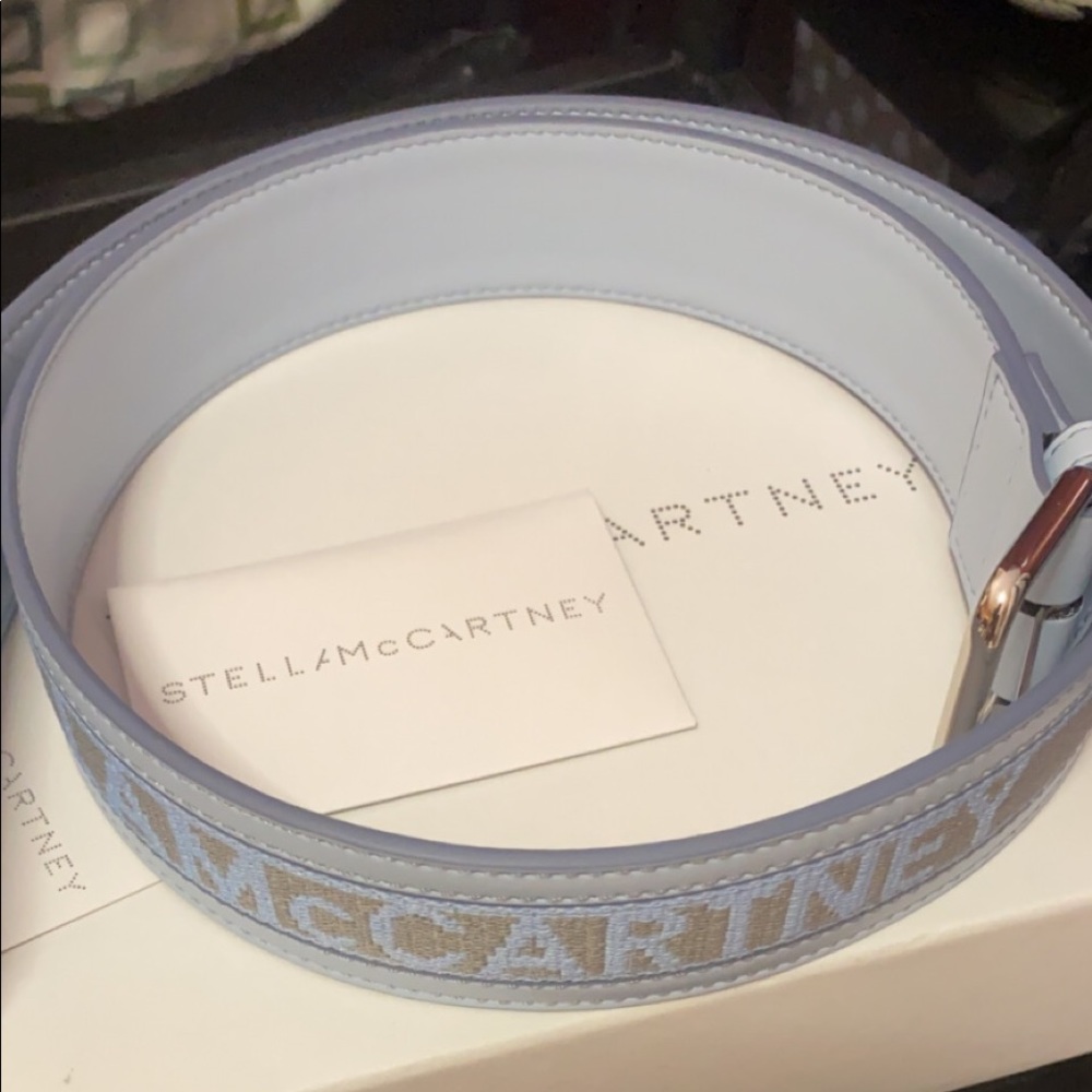 The Stella McCartney Monogram Belt in Light Grey/Azur was made for a logo lover